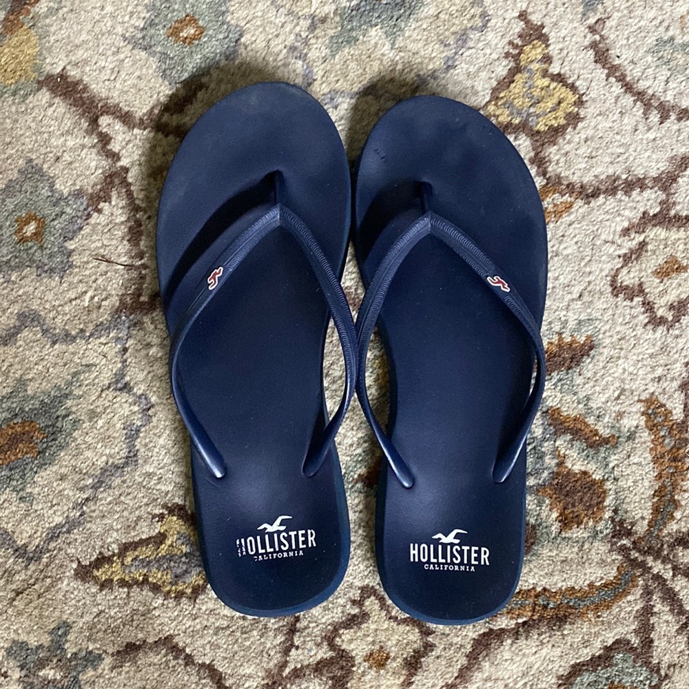 Hollister womens navy flip flops, size 9